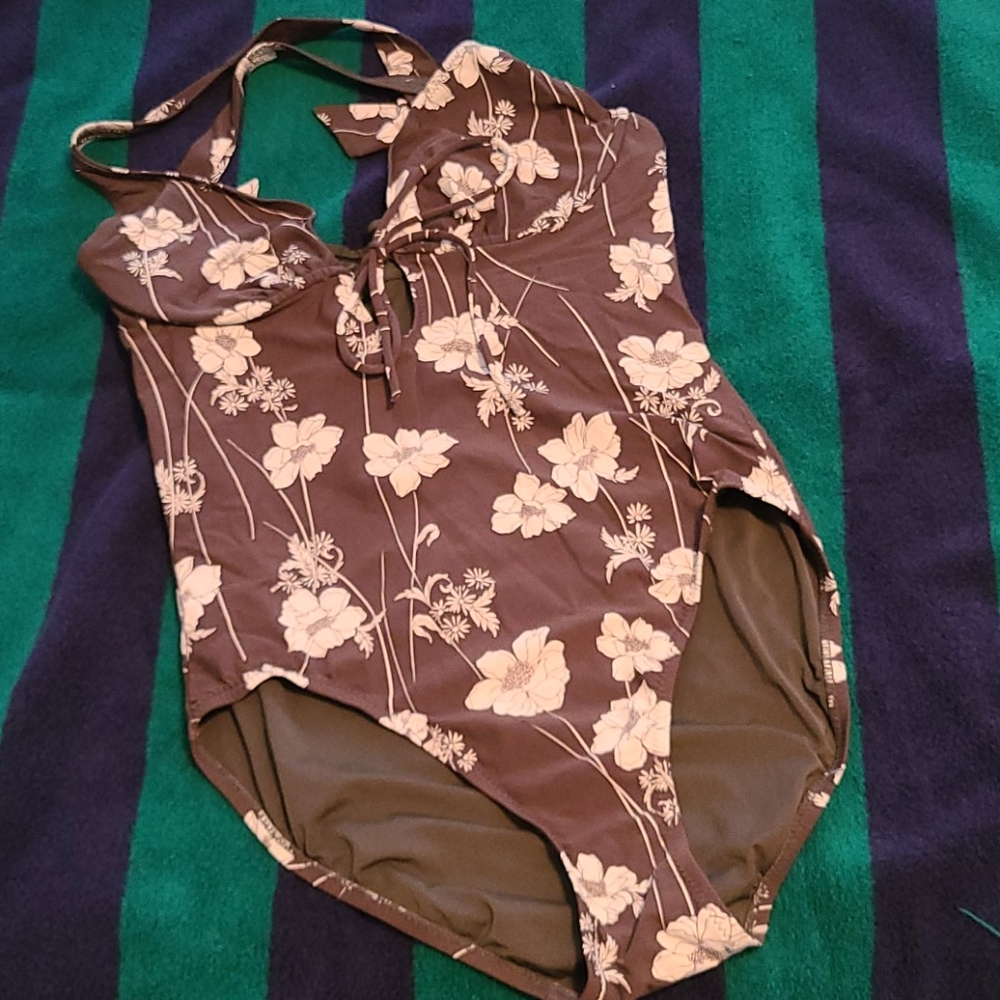 Like new, worn once or twice one piece bathing sui